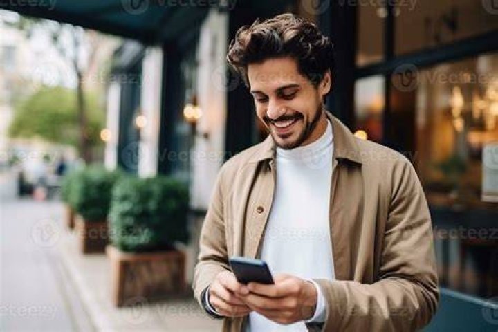 A man using his phone | Source: Unsplash