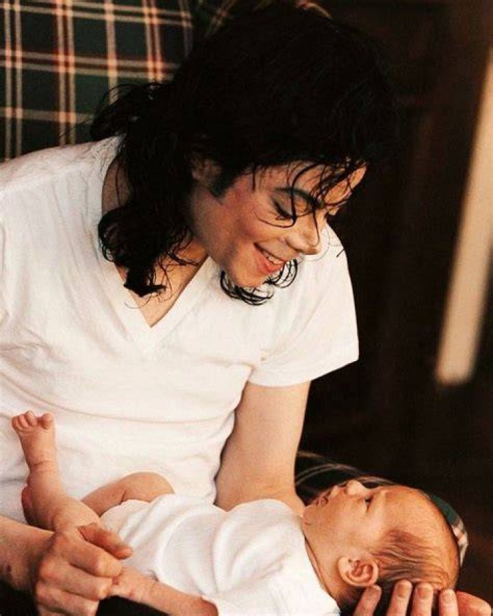 A young Prince Jackson with his siblings Paris and Blanket at the public memorial service for their father, Michael Jackson at the Staples Center on July 7, 2009. | Source: Getty