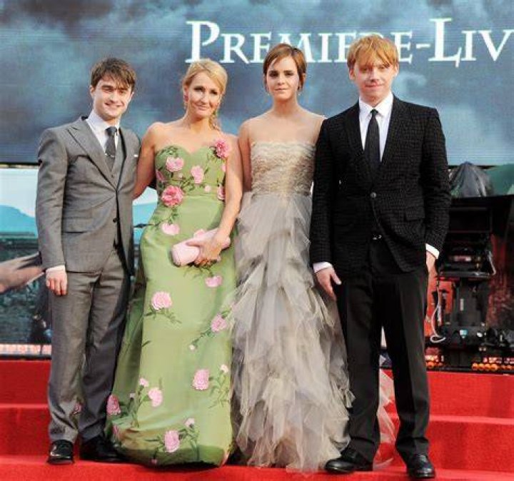 Actors Rupert Grint, Author JK Rowling, Daniel Radcliffe and Emma Watson attend the world premiere of the first Harry Potter film, 'Harry Potter and the Philosopher's Stone' at the Odeon Leicester Square, London, November 4, 2001. | Source: Getty Images