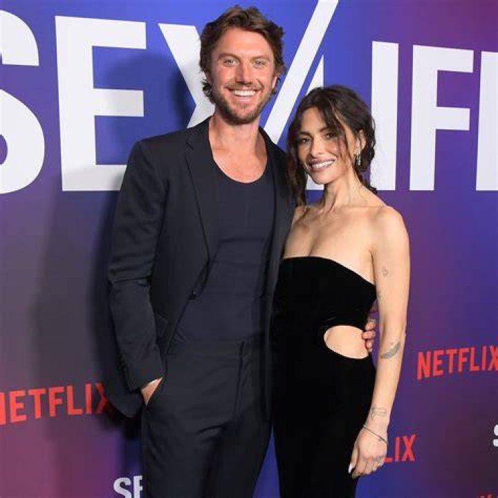 Adam Demos and Sarah Shahi at the season two special screening of "Sex/Life" at the Roma Theatre at Netflix - EPIC in Los Angeles, California, on February 23, 2023. | Source: Getty Images