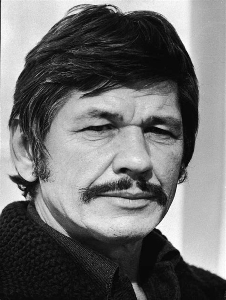 American actors Charles Bronson and David Carradine relaxing at the Cannes Film Festival, 1977. | Source: Getty Images