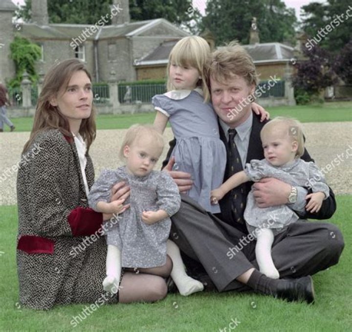 Earl Spencer pictured with his wife Raine Spencer in front of their home Althorp House. / Source: Getty Images