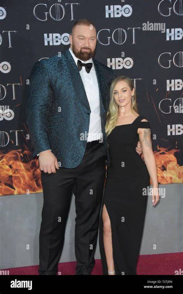 Hafthor Julius Bjornsson and Kelsey Henson attend the premiere of "Game of Thrones" at Radio City Music Hall on April 3, 2019, in New York City. | Source: Getty Images.