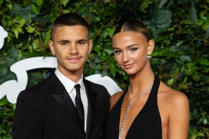 Romeo Beckham and Mia Regan at The British Fashion Awards in London, England, on November 29, 2021. | Source: Getty Images