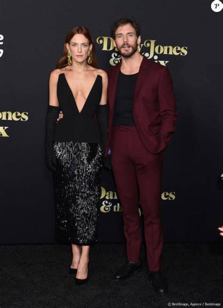 Sam Claflin with Riley Keough, and Reese Witherspoon at the Los Angeles Premiere of Prime Video's "Daisy Jones & The Six" in February 2023, in Hollywood, California. | Source: Getty Images.