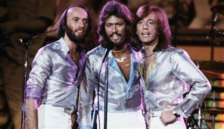 The popular disco band, The Bee Gees, pose for a portrait | Source: Getty Images